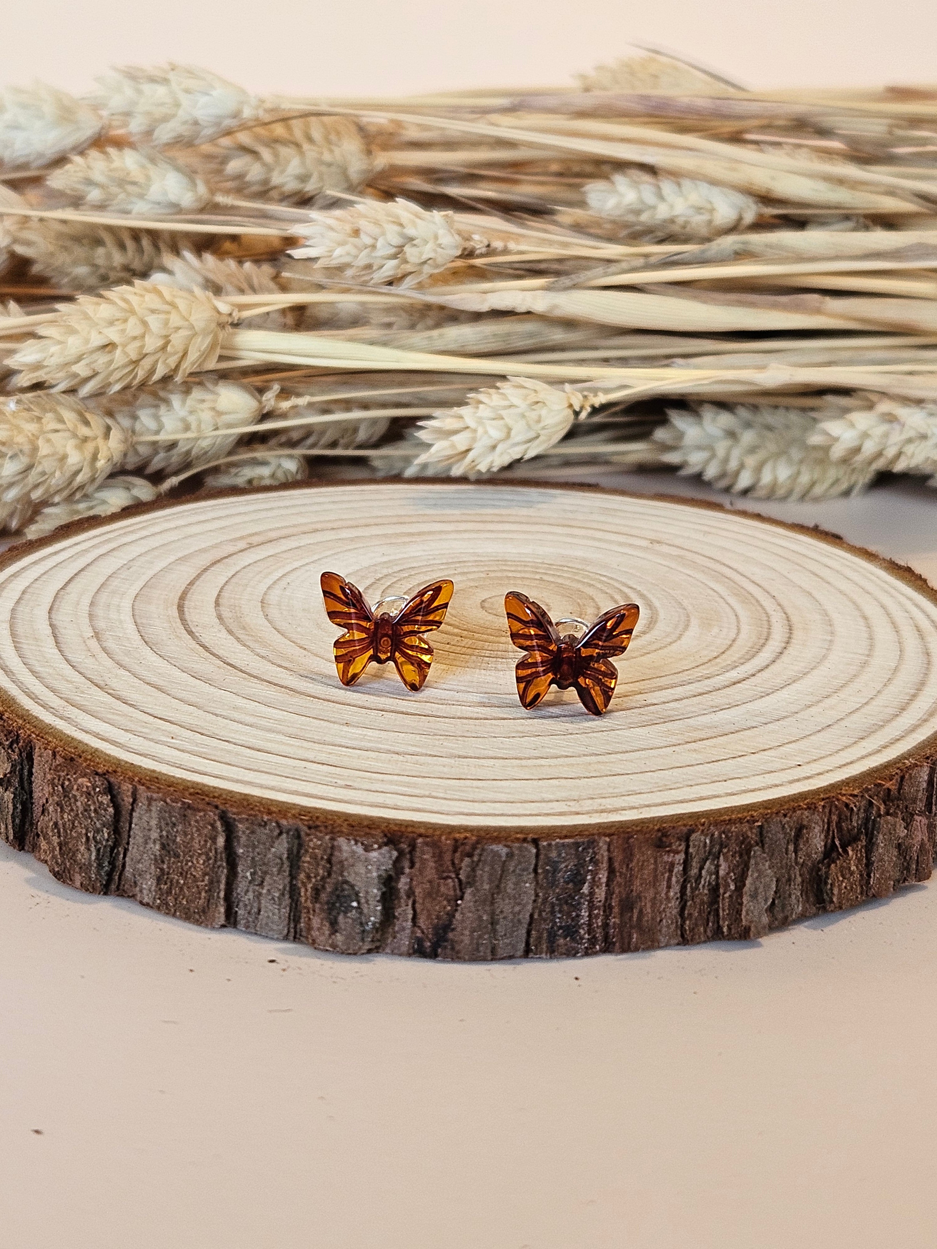 Boucles d'oreilles ambre papillon cognac enfant