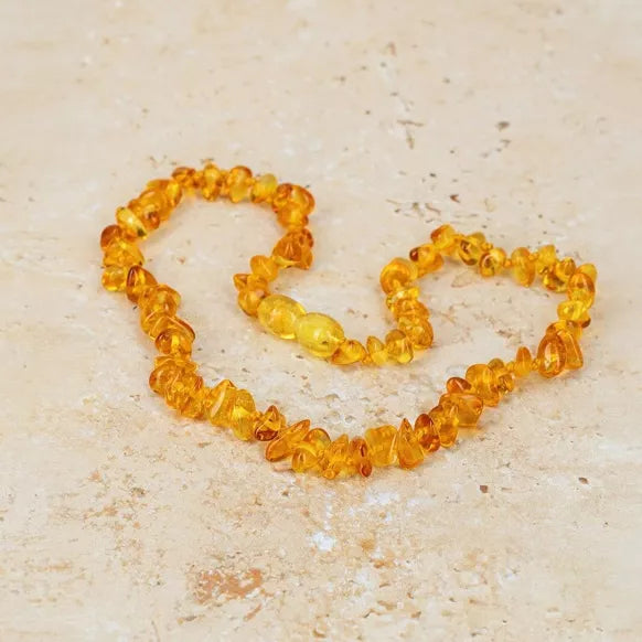 Collier de dentition ambre miel